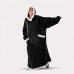 ternet tæppe med ærmer og hætte - oversized design med varme og bevægelsesfrihed